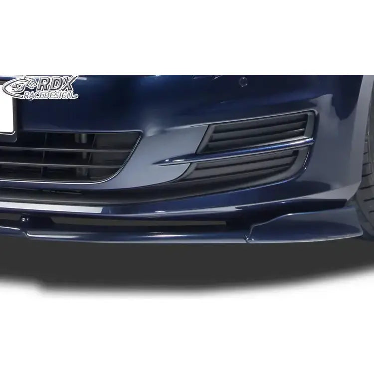 Frontleppe til Volkswagen Golf 7 Vario X, mørkeblå bilfront med svart grill og glinsende spoiler.