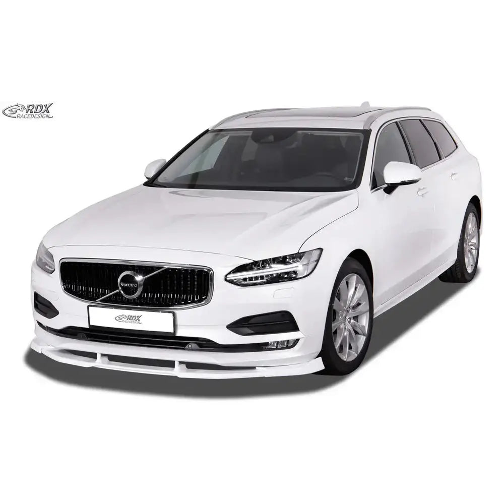 Frontleppe til Volvo V90/S90 16-20 montert på hvit bil med sorte detaljer, sett skrått forfra.
