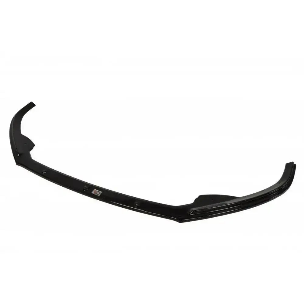 Frontspoiler VW Jetta VI GLI i sort blank plast, sett skrått med synlige festepunkter og logo.