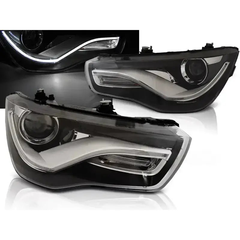 Frontlykter Audi A1 04.10-12.14 Black Tru DRL med LED-lyslist og refleks, sett forfra og fra skrå vinkel.