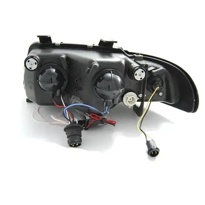 Headlamp Audi A4 Angel Eyes CCFL Black sett bakfra med ledninger og kontakter mot hvit bakgrunn.