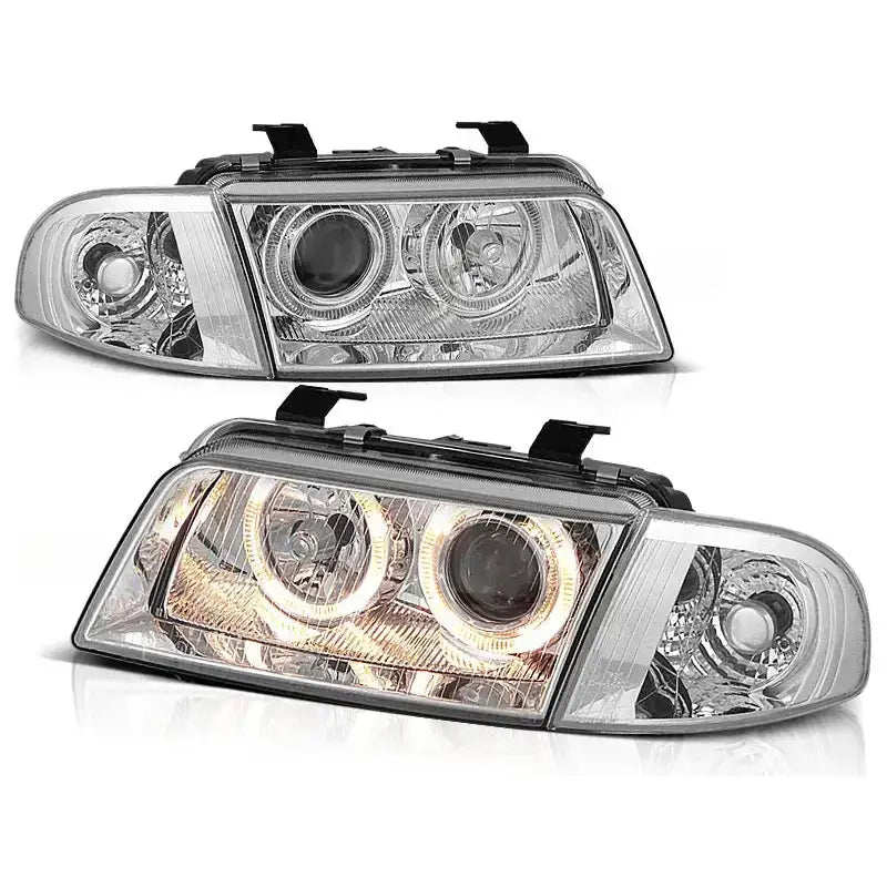 Frontlykter Audi A4 11.94-12.98 Angel Eyes med klare linser og svarte detaljer, ett sett med lys på.