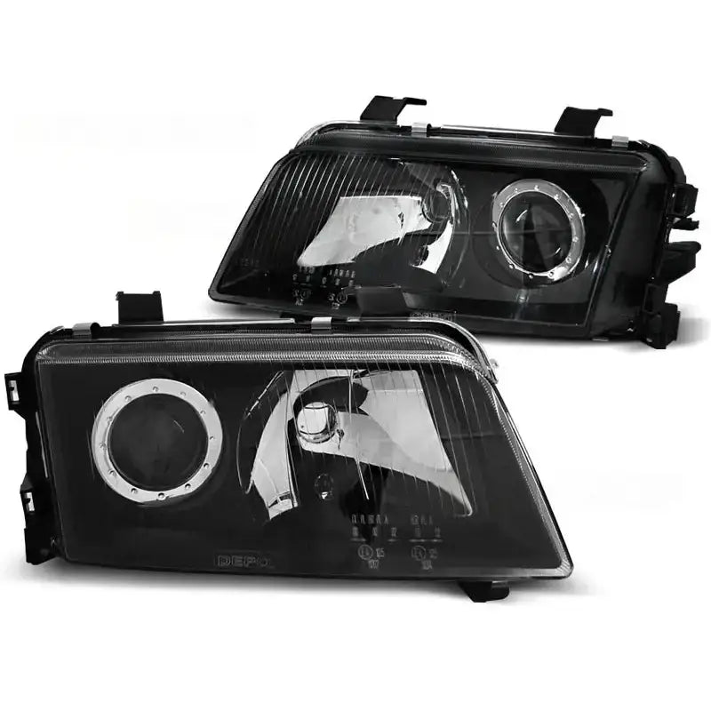 Frontlykter Audi A4 11.94-12.98 Black W5W med klare linser og sirkulære detaljer sett forfra.