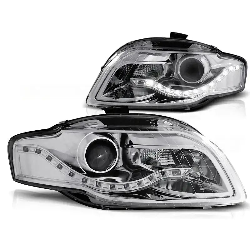 Hovedlykter Audi A4 B7 med klar plast, sort innfatning og LED-striper sett skrått forfra.