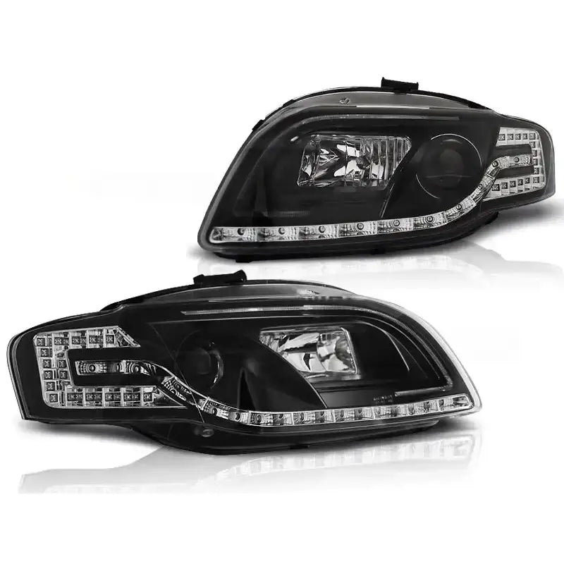 Hovedlykter Audi A4 B7 svarte LED Tube Lights med klare linser og moderne design fra skrå vinkel.