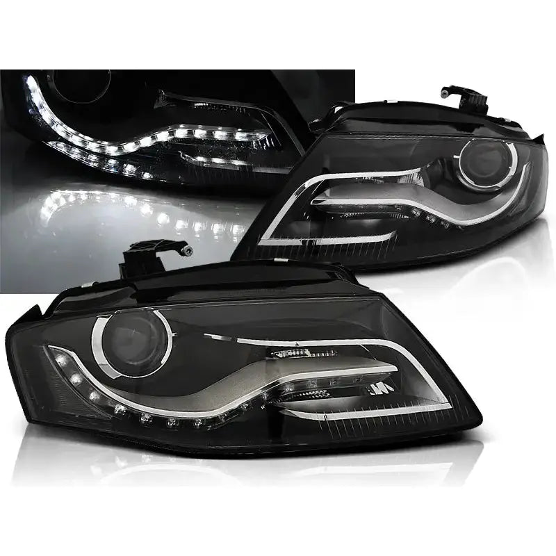 Frontlykter Audi A4 B8 Tru DRL Black med LED-striper, sett fra skrå vinkel mot hvit bakgrunn.