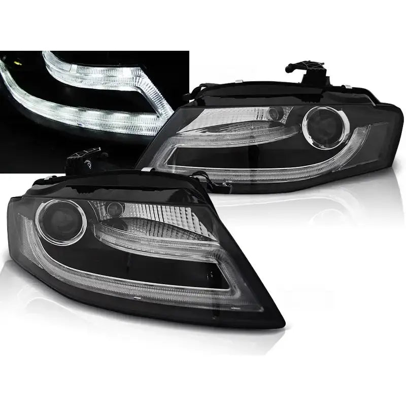 Frontlykter Audi A4 B8 Tru DRL Black Led med sølvdetaljer og tente LED-striper, vist fra skrå vinkel.