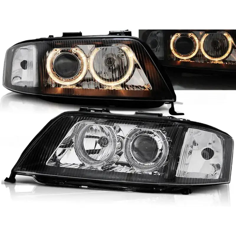 Frontlykter Audi A6 Angel Eyes Black med doble lysringer og gule LED-ringer, sett forfra.