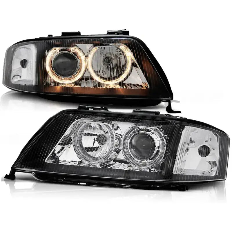 Hovedlykter Audi A6 Angel Eyes Black, svart og klar plast, LED-ring tent på øverste lykt.