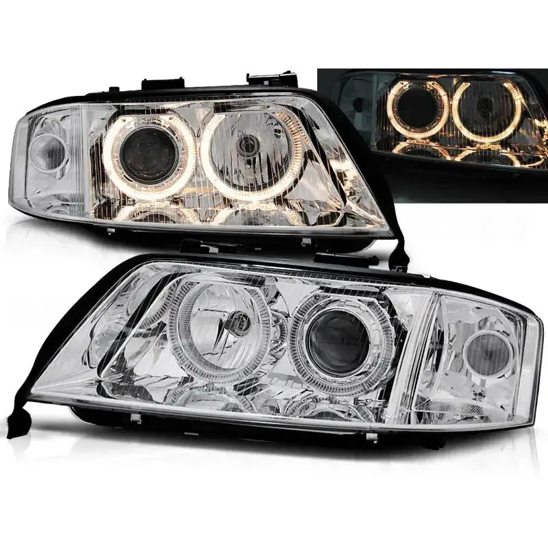 Frontlykter Audi A6 Angel Eyes Chrome med klar plast og kromdetaljer, én lykt tent med runde LED-lys.