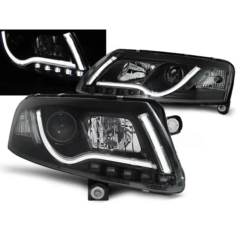 Frontlykter Audi A6 C6 LED Tube Lights Black med sorte rammer og tent LED, sett fra skrå vinkel.
