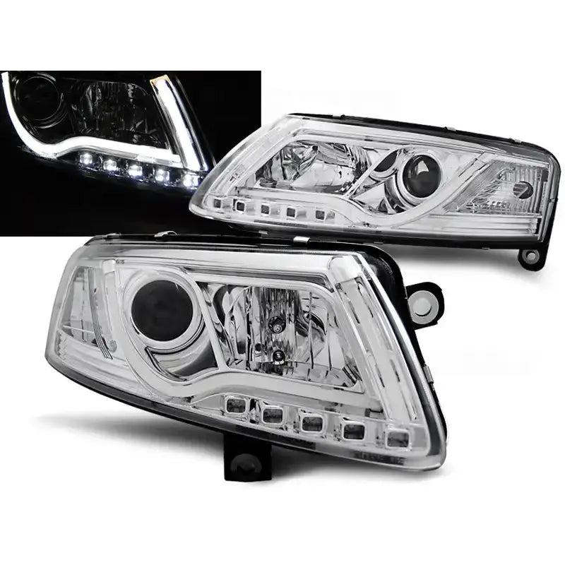 Frontlykter Audi A6 C6 LED Tube Lights Chrome sett fra skrå vinkel med tent LED-list.