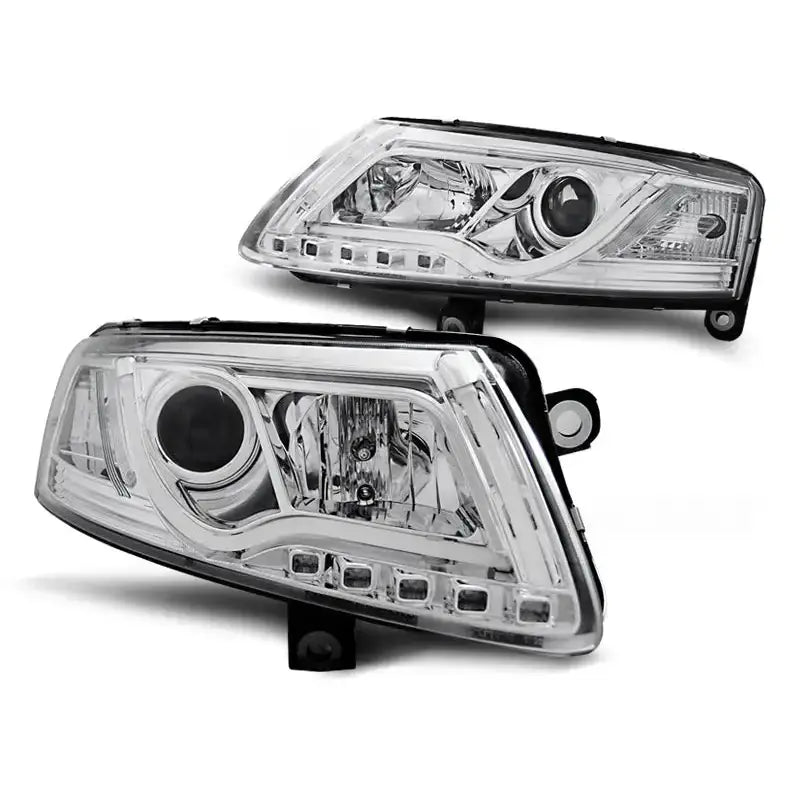 Hovedlykter Audi A6 C6 LED Tube Lights Chrome med svarte kanter og tydelige LED-elementer.
