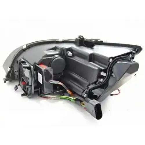 Headlamp bakside av Audi TT 10-14 8J med synlige ledninger og elektroniske komponenter.