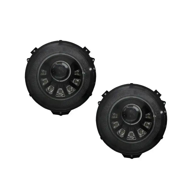 Frontlykter Bi-Xenon Dynamic/M-Square til Mercedes G-Klasse W463, to runde lykter med synlige LED-elementer.