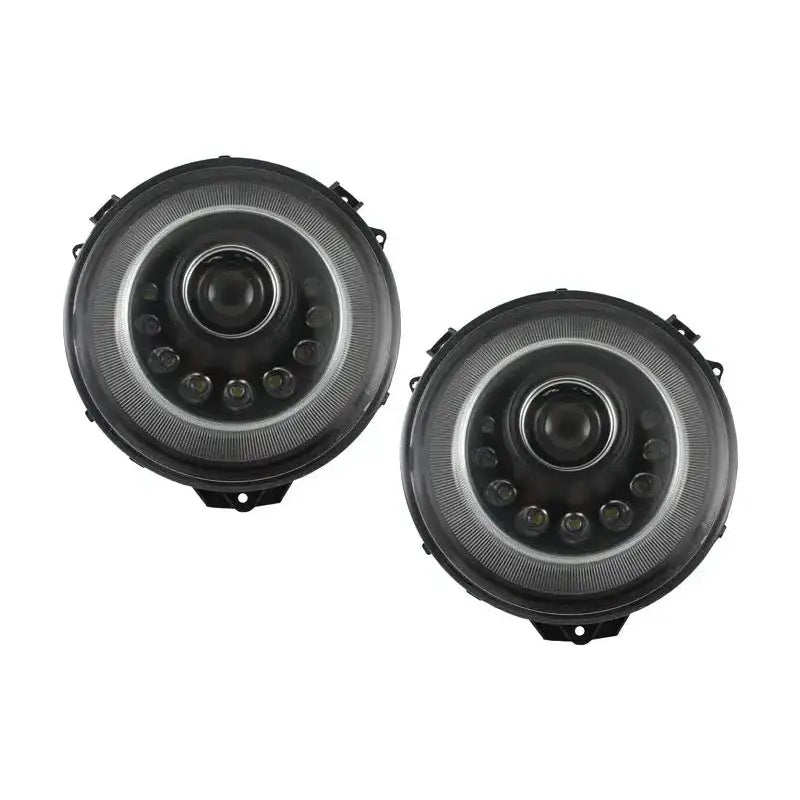 Frontlykter Bi-Xenon Mercedes G-Klasse W463 med LED-dioder, sirkelmønster og riflet kant.