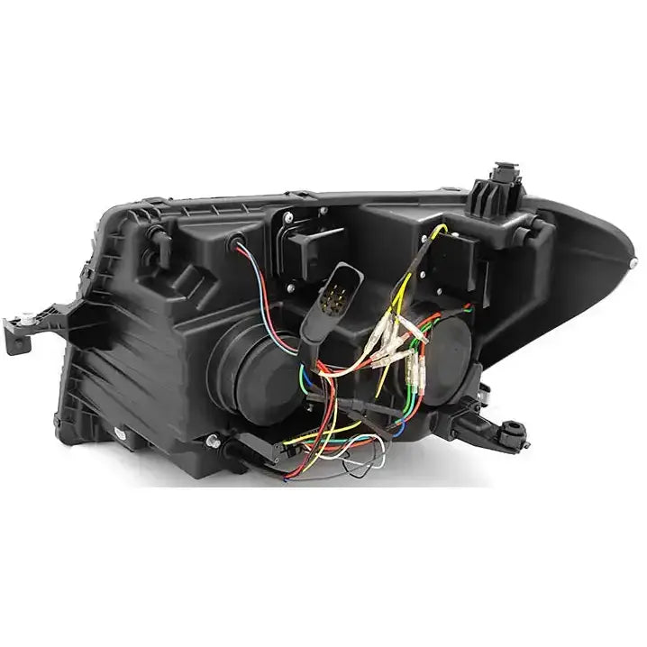 Hovedlys Black DRL SEQ for Volkswagen Crafter II sett bakfra med ledninger og monteringsfester synlige.