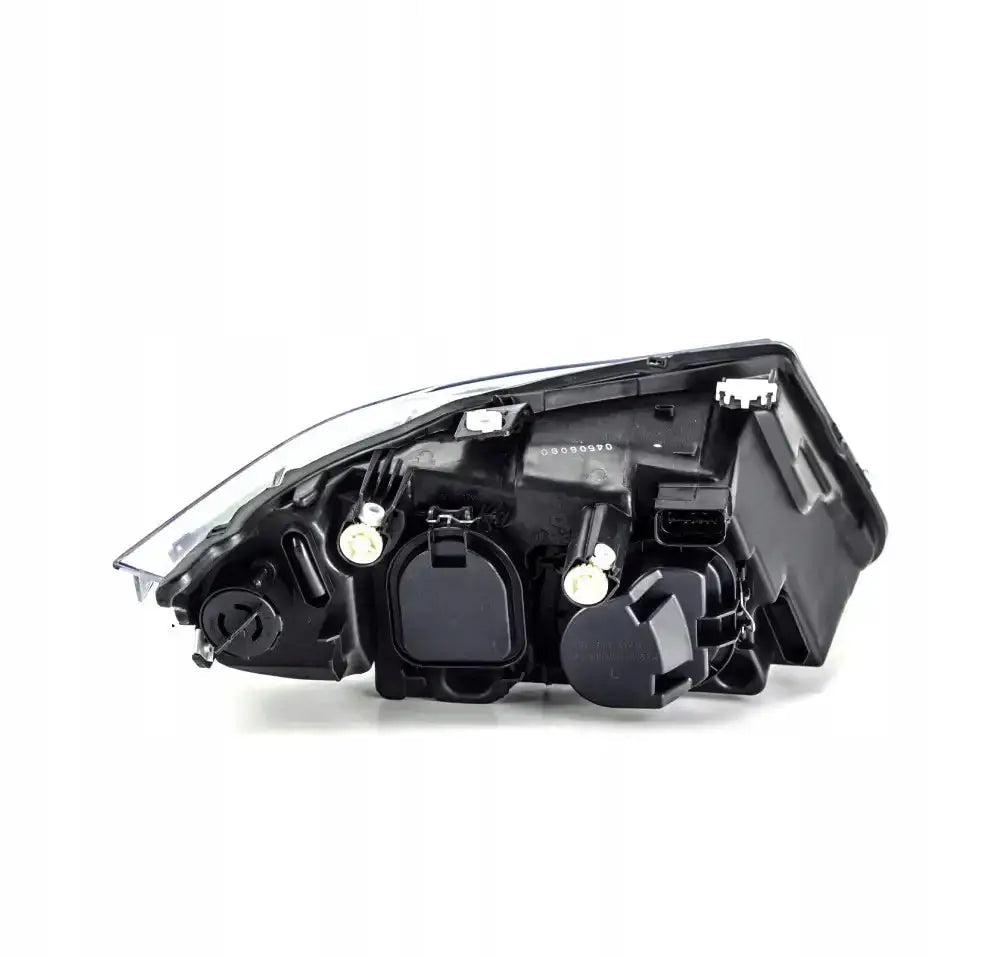 Frontlykter Bmw 3 Serie E90 E91 05-08 sett bakfra med synlige tilkoblinger og deksler.