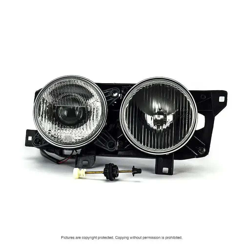 Hovedlykter Bmw 5-serie E34 98-01, to runde frontlys i klart glass med svart feste, sett forfra.