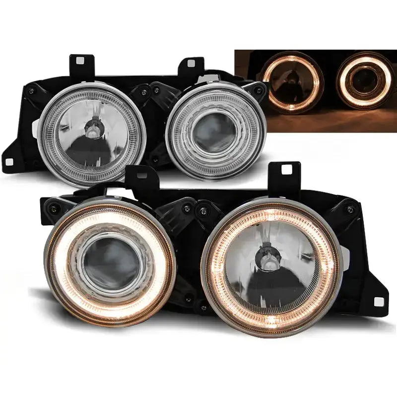 Frontlykter Bmw E32/E34 Chrome med LED-lysring, klare linser og svarte innramminger.