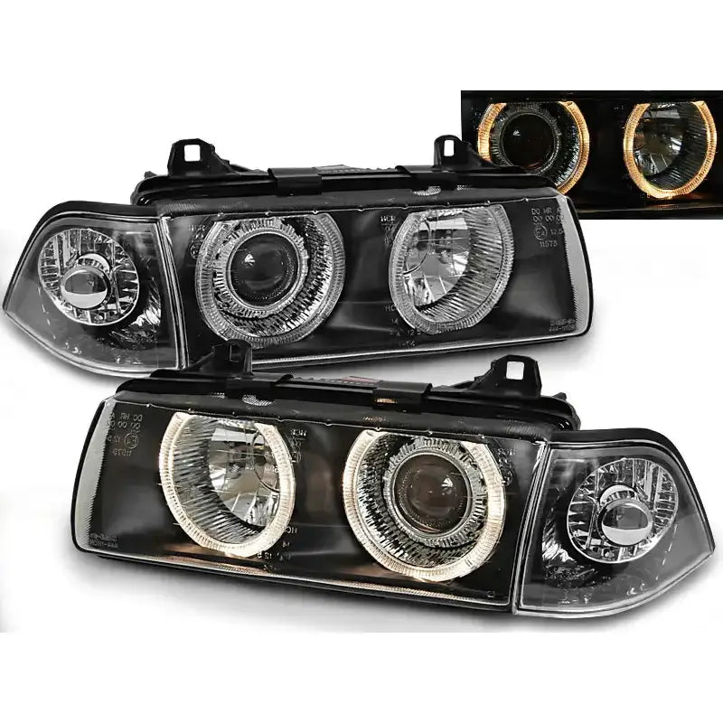 Frontlykter Bmw E36 Angel Eyes Black med klare linser og svarte detaljer, sett forfra med ringlys.