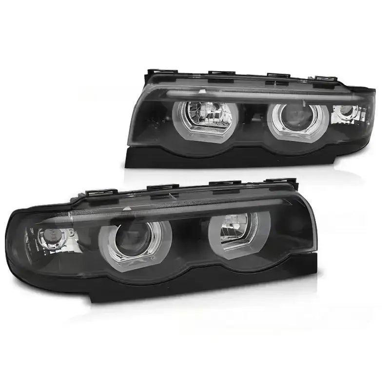 Frontlykter Bmw E38 94-01 3D Angel Eyes Led Black sett avbildet fra skrå vinkel mot hvit bakgrunn.