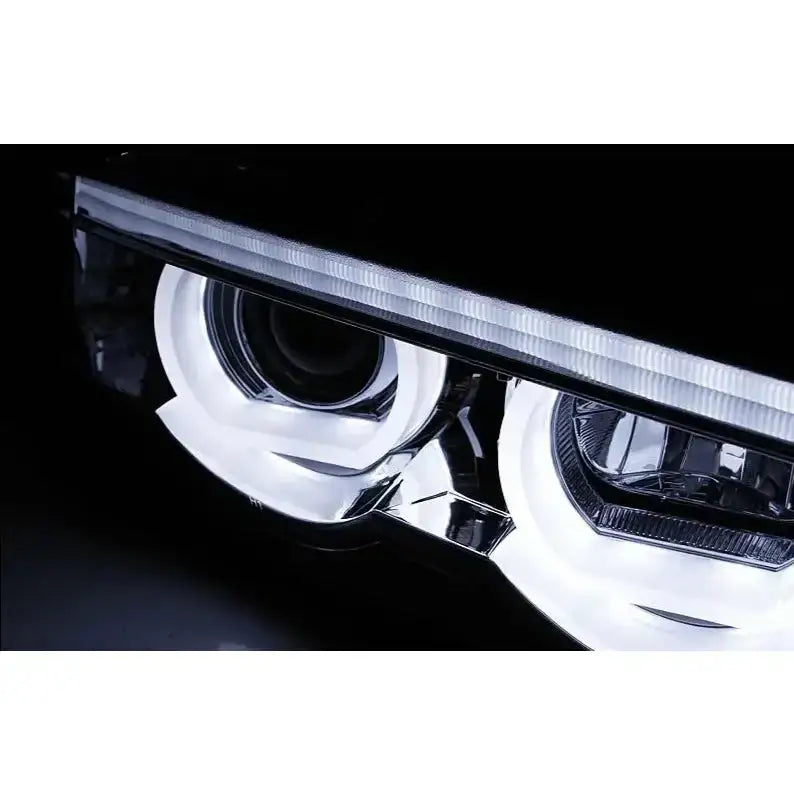 Hovedlys Bmw E38 3D Angel Eyes LED Chrome, nærbilde med kromdetaljer og hvite LED-ringer.