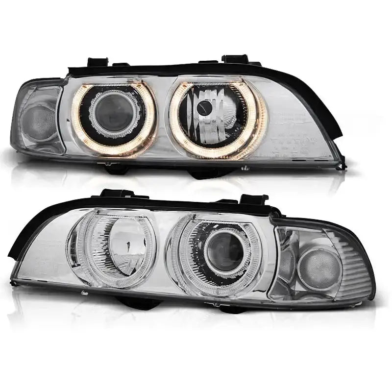 Hovedlykter Bmw E39 Angel Eyes D2S/H7 Chrome Xenon med LED-ringer og svarte detaljer, sett forfra.