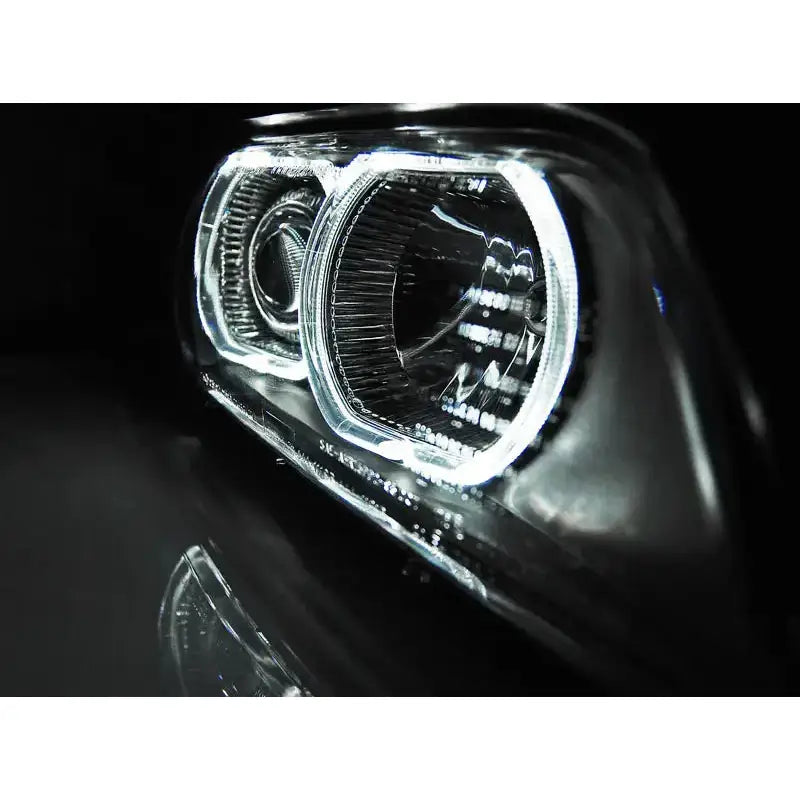 Hovedlys Bmw E39 Angel Eyes LED-lykt detalj med klart glass og reflekterende elementer.