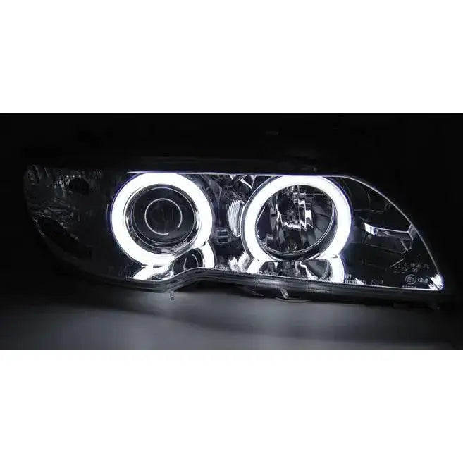 Hovedlys Bmw E46 Angel Eyes CCFL Chrome med doble hvite LED-lysringer og kromdetaljer.