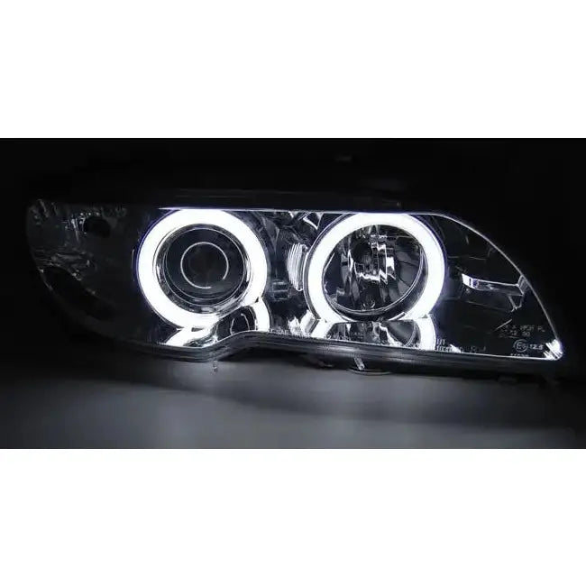 Hovedlys BMW E46 Angel Eyes Xenon frontlykter med klare linser og hvite LED-ringer sett forfra.