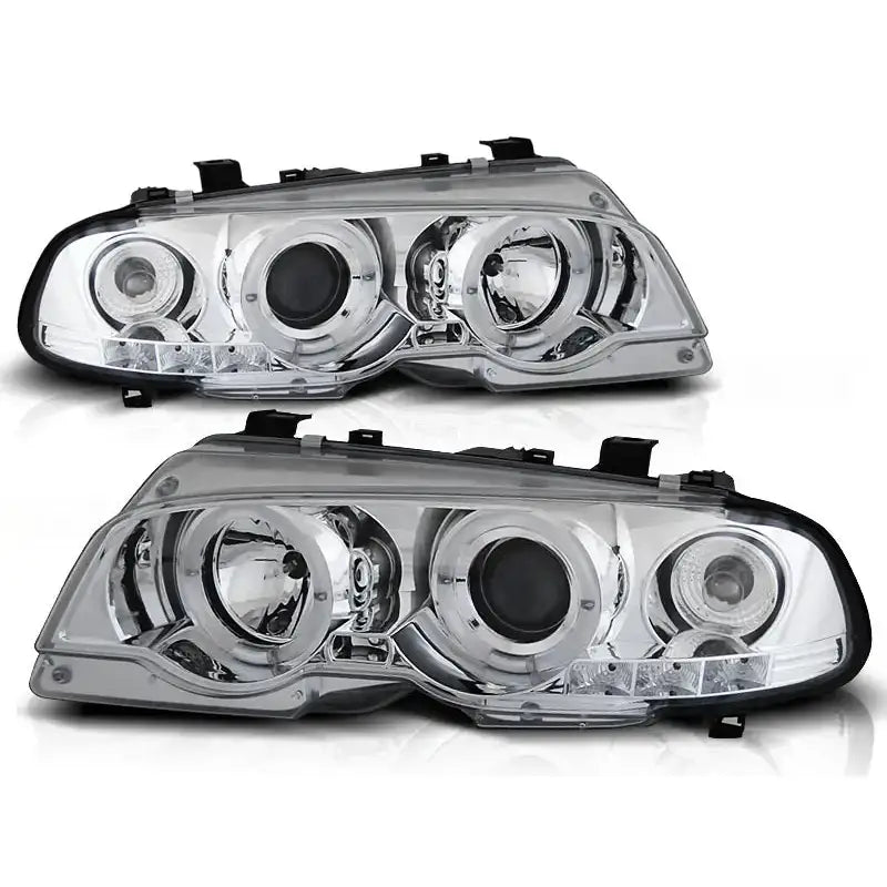 Hovedlykter Bmw E46 Coupe Angel Eyes Chrome med klart glass og kromdetaljer, sett forfra og fra siden.