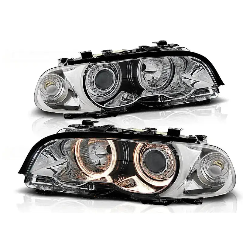 Frontlykter Bmw E46 Angel Eyes Chrome med sorte innfatninger, LED-ringer og klare reflektorer.