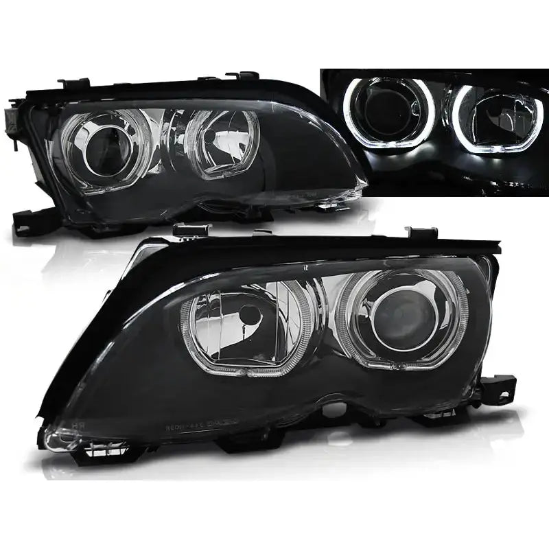 Frontlykter Bmw E46 Angel Eyes LED Black sett skrått med opplyste LED-ringer i mørket.