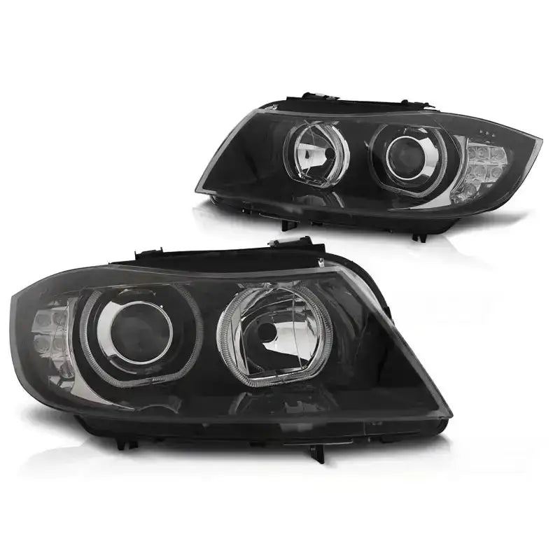 Hovedlykter Bmw E90/E91 03.05-11 med LED Angel Eyes og sorte detaljer, vist forfra.