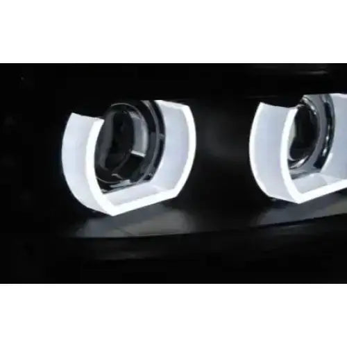 Hovedlys Bmw E90/E91 09-11 Xenon LED DRL Black AFS, to sirkulære lykter med hvite LED-lys.