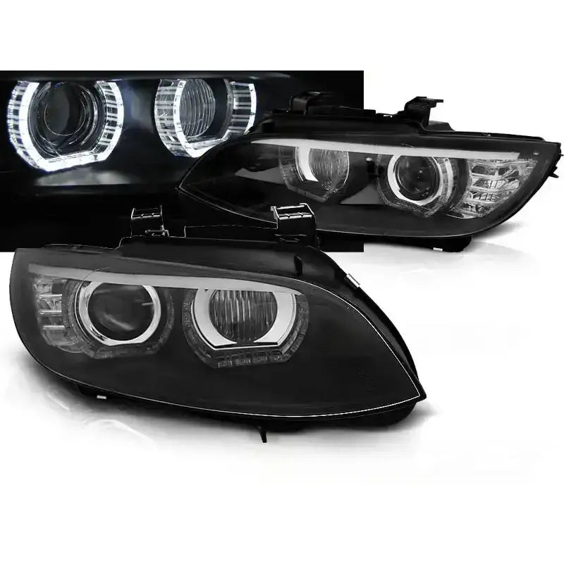 Frontlykter Bmw E92/E93 Angel Eyes LED Black med klare glass og markerte LED-ringer, skrå vinkel.
