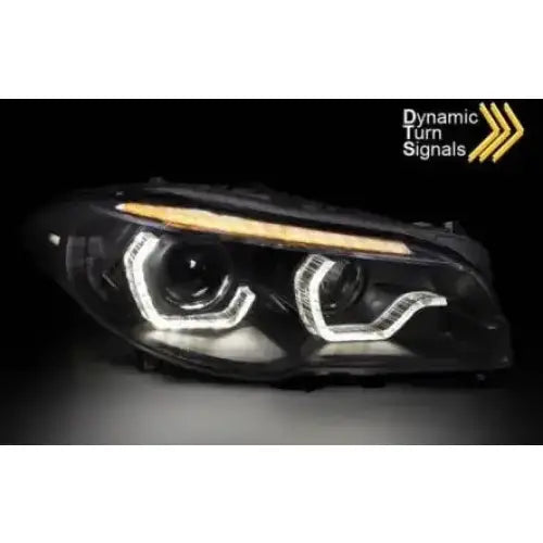 Hovedlykter Bmw F10/F11 10-13 med LED Angel Eyes og oransje dynamiske blinklys, sett forfra.