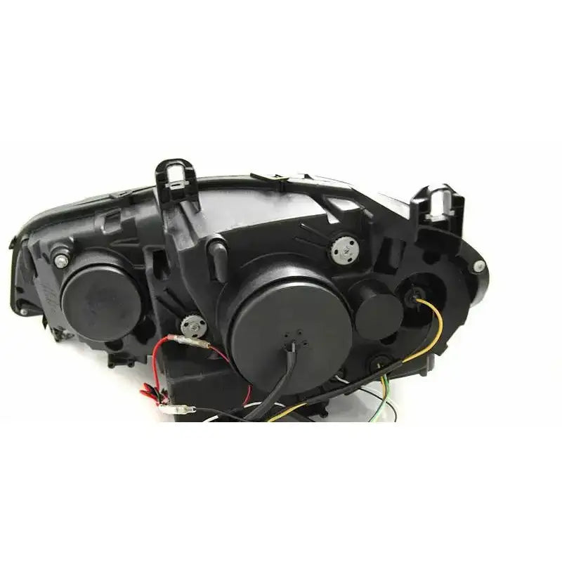 Headlamp bakside av Bmw X5 E70 07-10 AE DRL Led Black HID med synlige ledninger og monteringsdetaljer.