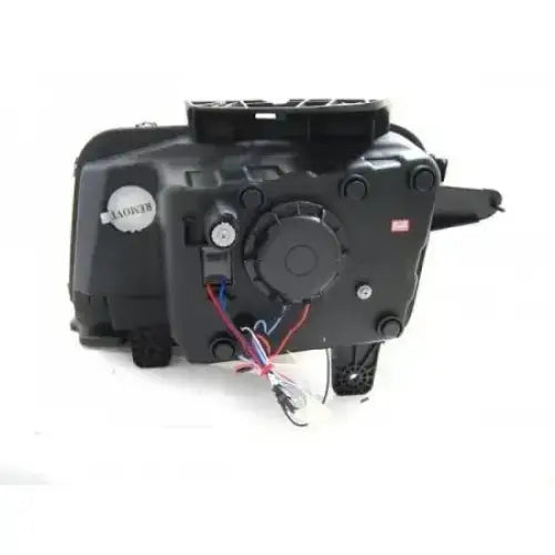 Headlights Chevrolet CAMARO 09-13 Tube Light Chrome sett fra siden med synlige kabler og sølvfarget etikett.