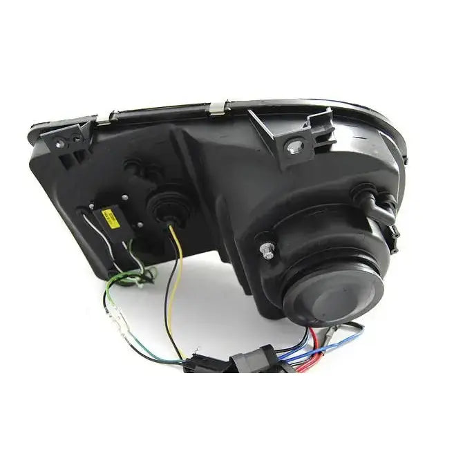 Headlamp Chrysler 300C 05-10 bakside med ledninger, festebraketter og detaljerte koblingspunkter.