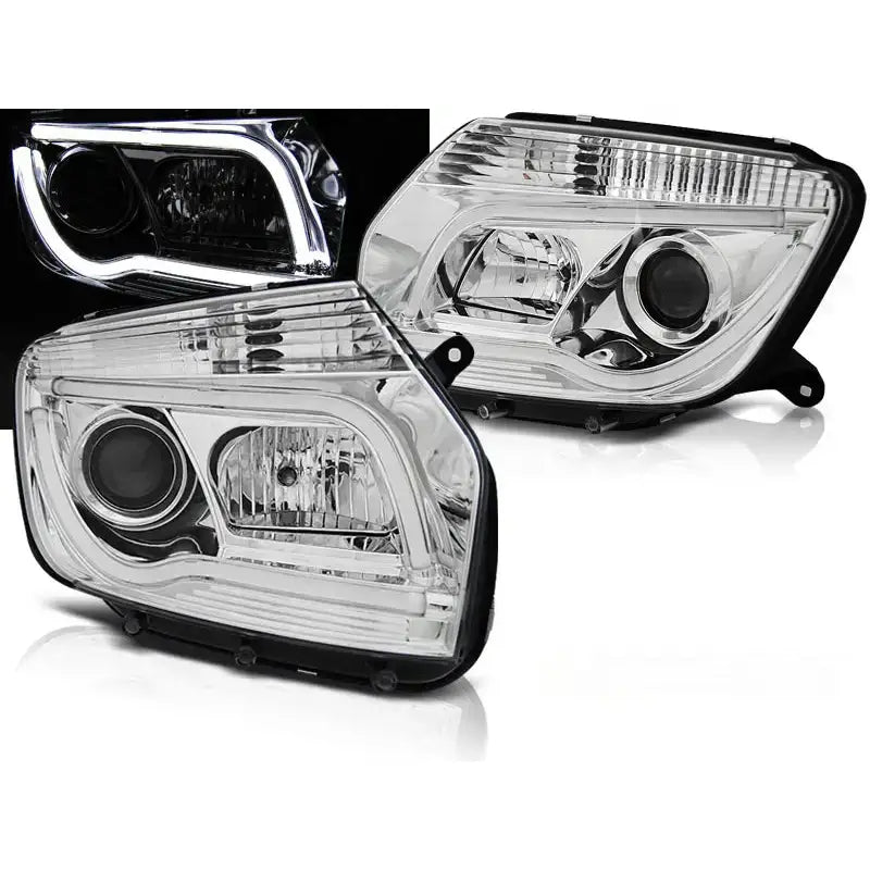 Frontlykter Dacia Duster 04.10-14 Chrome Tube Light med sorte kanter, LED-lys tent, vist fra skrå forside.