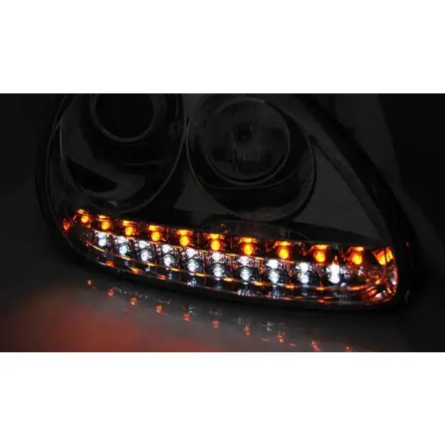 Hovedlys Daylight Chrome HID Xenon til Porsche Cayenne med oransje og hvite LED-lys tent.