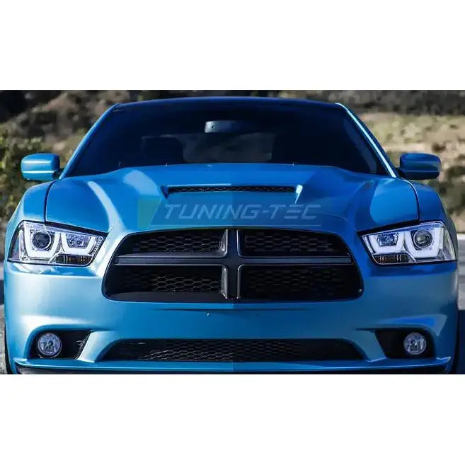 Headlights Dodge Charger LX II 11-15 tube light chrome på blå bil sett forfra med svart grill.