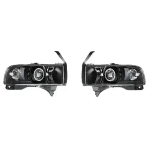 Frontlykter Dodge Ram 94-01 svart med klare linser og runde reflektorer, sett forfra.