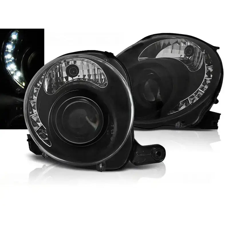 Frontlykter Fiat 500 07- Black Led sett forfra med runde linser og LED-lys detalj.