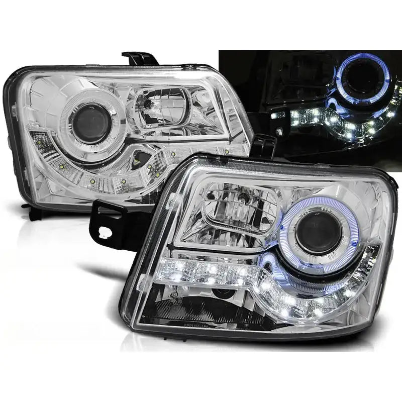Frontlykter Fiat Panda 03-12 Chrome med LED-lys og blå lysring, sett fra skrå vinkel.