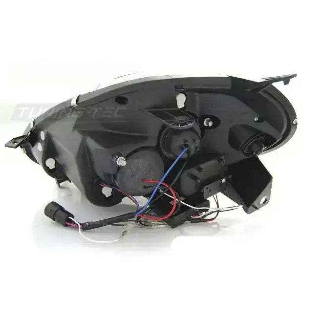 Hovedlys bakside av Fiat Punto EVO 10.09-12 Black DRL LED med synlige ledninger og skruefester.