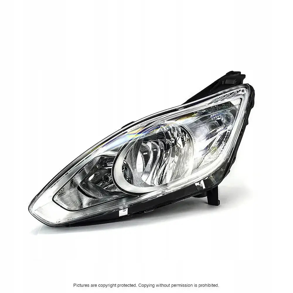 Hovedlykter Ford C-Max II 10-15 H7 med klart glass og svarte detaljer, sett fra skrå forside.