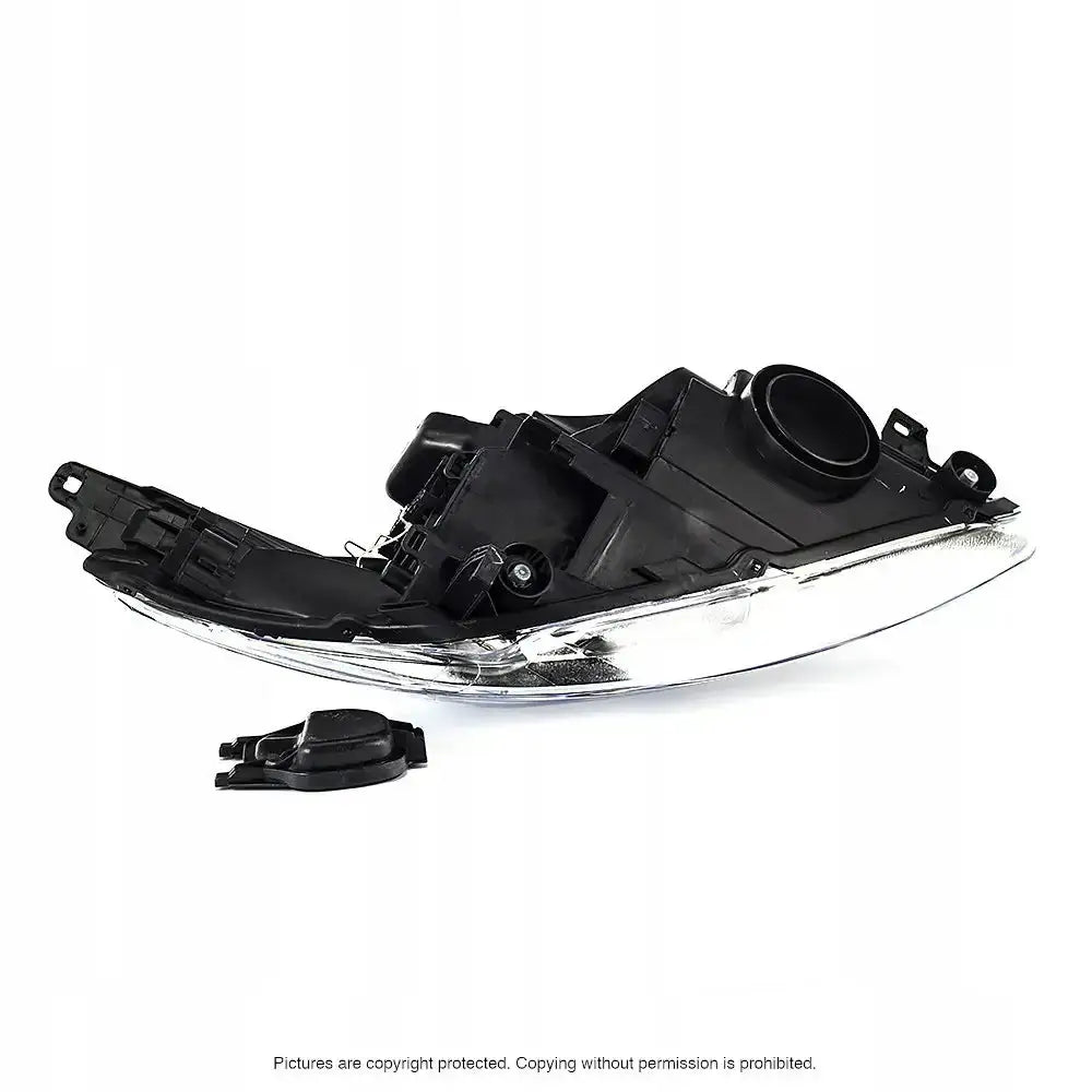 Hovedlykter Ford C-Max II 10-15 vist fra baksiden med monteringspunkter og løst plastdeksel.